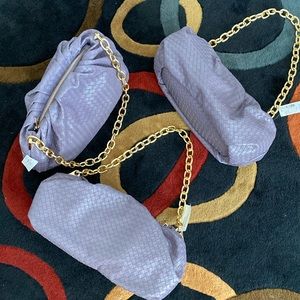 Penningtons beautiful purple weaved purse. Gold colour chain handle zip closure
